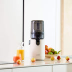 Mit dem Hurom E50-ST Orangensaft herstellen